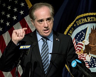 President Donald Trump is firing Veterans Affairs Secretary David Shulkin and replacing him with the White House doctor in the wake of a bruising ethics scandal and a mounting rebellion within the VA.
