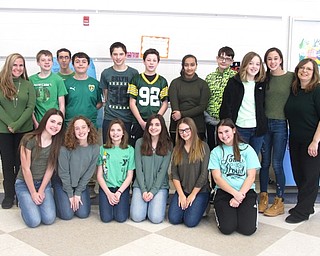 Neighbors | Zack Shively.The Poland Middle School students and staff wore green on Feb. 8 to show support for the Sandy Hook Promise as a part of their Start With Hello Week. Sandy Hook Promise is an organization started by families affected by the shooting at Sandy Hook Elementary. They aim to bring schools and communities closer together by combating social isolation.