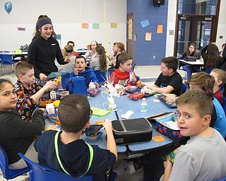 Neighbors | Zack Shively.Poland Middle School celebrated No One Eats Alone Day at lunch on Feb. 9. Older students facilitated conversation using sample questions to promote connections between students sitting by each other at random. The lunch stood as the final day of Start With Hello Week.