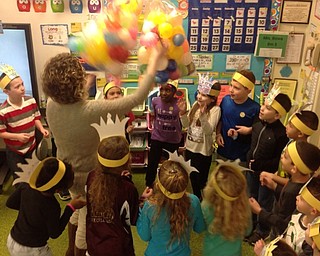 Neighbors | Submitted .Teacher Erica Knapick released balloons at Robinwood Elementary to celebrate 100 Days of Learning. Pictured clockwise from back left are Giovanni Hall, Eli Rojas, Jaliyah Tellington, Adelynne Ganser, Anthony Rovnak, Evan Cubilette, Bradyn Jackson, Reda Adkins-Hill, Jordan Hodge, Madilyn Belcastro, Gionna Sheppard, Myah Soares and Gabby Johnson.