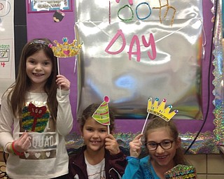 Neighbors | Submitted .Robinwood Elementary first-graders Adelynne Ganser, Myah Soares and Gianna Sheppard posed at the 100th Day photo booth for 100 Days of Learning.