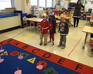 Neighbors | Zack Shively.The Valentine's Day classroom parties at Union Elementary featured different games and crafts in each classroom. Pictured, students in Ms. Gura's class played ring toss.