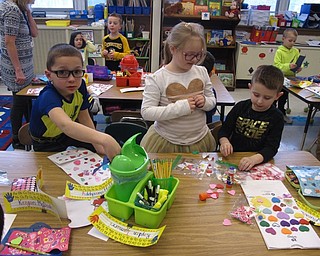 Neighbors | Zack Shively.The PTO of Union Elementary organized the art project on Feb. 9 and the classroom parties on Feb. 14. They brought stickers, pompoms and other materials for the students to decorate their Valentine's Day bags. They also set up the games and treats for their Valentine's Day parties.
