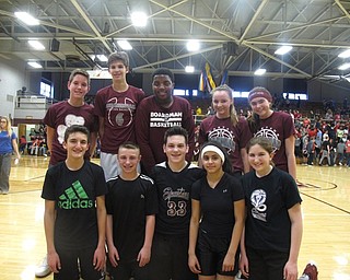 Neighbors | Zack Shively.Glenwood Junior High School competed in a week-long basketball tournament to raise money for the American Heart Association through their Hoops for Heart program. Pictured are the teams that won the tournament, with the seventh-grade team in black and eighth-grade team in maroon.