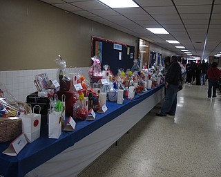 Neighbors | Zack Shively.The Fitch Band Spaghetti Dinner offered a basket raffle, a 50/50 raffle and a bake sale. The bands placed out 93 baskets for attendees to try to win.