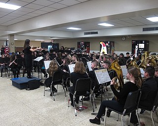Neighbors | Zack Shively.The Fitch Band Spaghetti Dinner featured performances by the freshman band, the concert band, both Jazz 1 and Jazz 2 bands, the Fitch symphonic band, the fifth-grade band and the middle school bands. Pictured, Jackie Mortimer directed the fifth-grade band to showcase what they have learned since coming back from winter break.