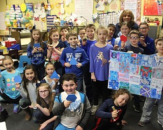 Neighbors | Abby Slanker.Hilltop Elementary School second-grade teacher Edith Narducci’s class celebrated the school’s Winter Olympics-themed Right to Read week by creating a new country, Geometry Giants. They showed off their country’s flag and dressed in blue to honor their new country.