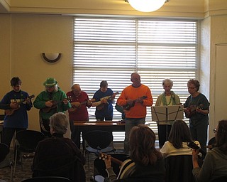 Neighbors | Zack Shively.At the end of the ukulele program at the library, a group called The Ukeahloics played a couple of songs for St. patrick's Day. The performed "Oh Danny Boy" and "Molly Malone."