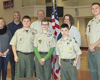 Neighbors | Submitted.Pictured are Boy Scout Troop 25 parents Greg and Cheryl Hamilton, and Jason and Lisa Henry with Scouts Andrew Hamilton, Cade Henry and Owen Direnzo, with Assistant Scoutmaster Hunter Hykes presenting their Tenderfoot Award.