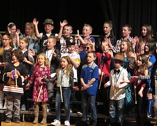 Neighbors | Zack Shively.The Dobbins fourth-grade students had their annual concert at Poland Seminary High School on March 15. Pictured, the students sang "Happy" Pharrell Williams.