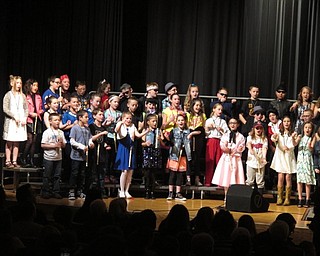 Neighbors | Zack Shively.Music teacher Dana Emery directed the fourth-grade Dobbins students for their concert at Poland Seminary High School. Pictured, the students sang the theme song to the Disney cartoon “Phineas and Ferb.“