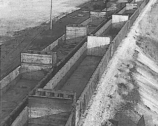 ON THE ROAD TO NOWHERE - Rusting railroad cars stand idle before the shut down steel plants in Youngstown.  As communities buckle under mill closings and layoffs, steel companies are turning with mounting urgency and mixed results to Washington...Associated Press photo.