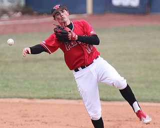 William D. Lewis The Vindicator YSU's SS Cody Dennis(10) make the throw to first for an out during 3-30-18 game at Eastwood with UIC.