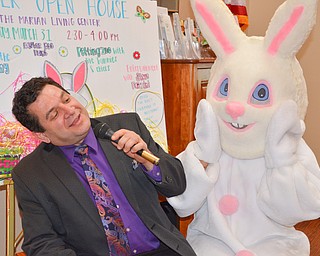 Steve Frazzini serenades the Easter bunny at the Marian Assisted Living Center at Mercy's Assumption Village campus in North Lima on Saturday March 31, 2018.

Sydney Turney, a Boardman High School student, wore the bunny costume for National Honor Society hours.

Photo by Scott Williams - The Vindicator