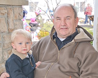 Eighteen-month-old Ace McCall sits on grandpa Bob Yosay's lap while waiting for the Easter Egg hunt to begin at the Marian Assisted Living Center at Mercy's Assumption Village campus in North Lima on Saturday March 31, 2018.

Photo by Scott Williams - The Vindicator