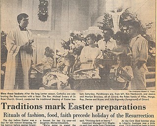 BLESS THESE BASKETS: After the long Lenten season, Catholics are celebrating the Resurrection with a feast.  The Rev. Michael Swierz of St. Rose Church, Girard, conducted the traditional blessing of Easter baskets Saturday.  Parishioners are, from left, Kim Nemkovich, and Jessica and Marilyn Brocious, all of Girard; the Palen Family of Niles, Marge, Ray, Denise, and Bryan; and Julia Bigowsky (foreground) of Girard.

Photo by Robert K. Yosay - The Vindicator