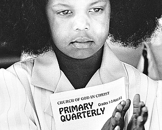 EASTER SERVICES SPECIAL - JUST LEARNING - Kara Smith, 5, of Youngstown, clapped to the inspirational music at Phillips Chapel Church of God in Christ.  

Photo taken April 19, 1987. 

Photo by Patricia L. Fife - The Vindicator 