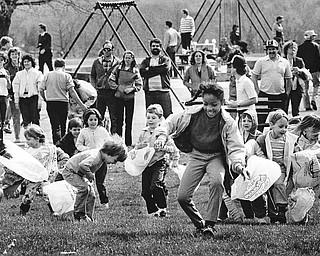 EGG HUNT SWEET STUFF FOR YOUTHS - About 400 youngsters participated in an Easter egg hunt Saturday at Mill Creek Park's James Wick Recreation Center.  Eager youngsters raced to collect their loot as their parents looked on.

Photo by William D. Lewis - The Vindicator