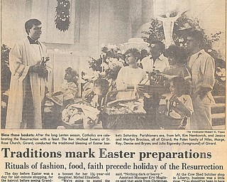 BLESS THESE BASKETS: After the long Lenten season, Catholics are celebrating the Resurrection with a feast.  The Rev. Michael Swierz of St. Rose Church, Girard, conducted the traditional blessing of Easter baskets Saturday.  Parishioners are, from left, Kim Nemkovich, and Jessica and Marilyn Brocious, all of Girard; the Palen Family of Niles, Marge, Ray, Denise, and Bryan; and Julia Bigowsky (foreground) of Girard.

Photo by Robert K. Yosay - The Vindicator