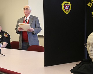 A bust constructed in 2010 provides a likeness of the man whose remains were found near Mosquito Lake in July 2006. Dr. Humphrey Germaniuk, Trumbull County coroner, right, tells the media he does not know what caused the death of Gregory L. Griffin, but he has ruled it a homicide, as Bazetta Police Chief Mike Hovis looks on.