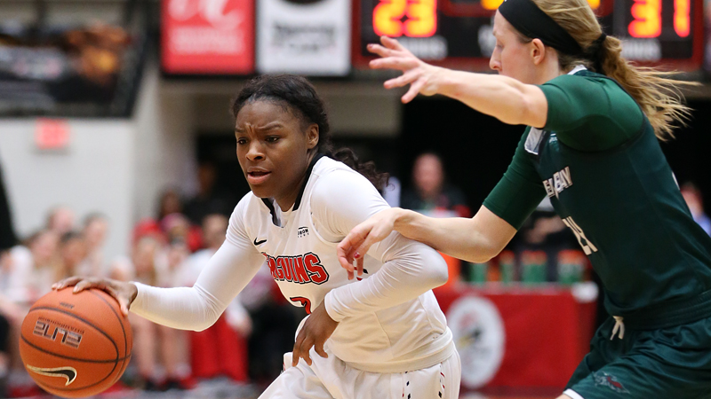 Youngstown State’s Indiya Benjamin dribbles up the court during a game against Green Bay in February.