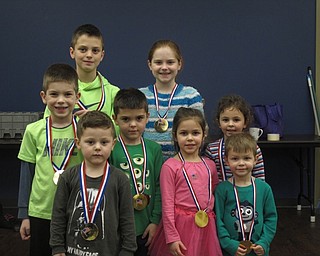 Neighbors | Zack Shively.Each child who attended the Boardman library's "Go for Gold!" event received a gold medal with an American flag on it after they had finished participating in the games.