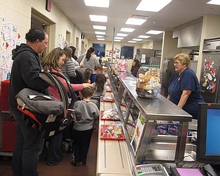 Neighbors | Zack Shively.The Kindergarten Kickoff at Austintown Elementary School allowed families to tour the school. They walked through the lunch line, got on the school buses and walked throughout the school to get both the children and parents familiar and comfortable with the school.