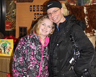 Neighbors | Abby Slanker.Hilltop Elementary School fourth-grade student Abrianna Makara invited her mom, Trisha, to the school’s K.I.S.S. event, which kicked off the school’s annual Wild Wild West themed book fair.