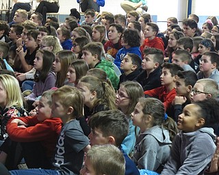 Neighbors | Zack Shively.The students at Dobbins Elementary waited excitedly in the school's auditorium for the puppet show to begin. They were engaged with the story throughout and enjoyed the humor and message.