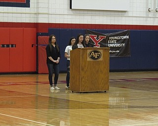 Neighbors | Zack Shively.Junior Gia DiRenzo read the names of the 17 people who were killed at Majory Stoneman Douglas High School on Feb. 14 at Fitch's safety assembly. She was joined by members of the student council. They led a moment of silence to commemorate the victims.