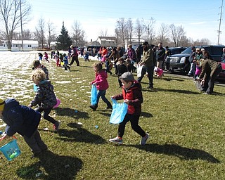 Neighbors | Zack Shively.Heritage Presbyterian set up three age groups for their Easter egg hunts. They had ages 1-5, 6-8 and 9-12 in different groups. Pictured, children ages 1-5 grabbed Easter eggs.