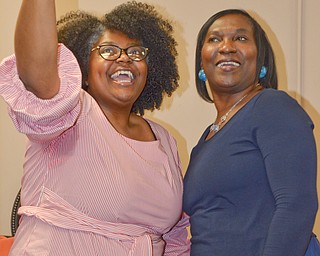 Carmella M. Williams, left, Minority Business Assistance Center director, takes a selfie with her aunt, Faun Williams, at the Women in Entrepreneurship Center opening at Youngstown Business Incubator on Thursday April 5, 2018.

Photo by Scott Williams - The Vindicator.