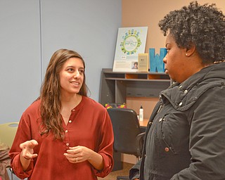 Gianna Centofanti, left, from Youngstown Business Incubator, talks with TaRee Avery, Dough House Cookies entrepreneur, at the Women in Entrepreneurship Center opening at Youngstown Business Incubator on Thursday April 5, 2018.

Photo by Scott Williams - The Vindicator