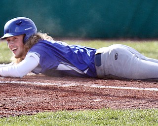 Poland's Reed McCreery(5) scores during 1rst inning of 4-5-18 game with Struthers at Cene.

William D. Lewis The Vindicator 