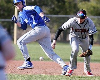 Poland's Zachary Yaskulka(44) breaks for 3 rd as Struthers SS Kevin Caldwell(10) tries to field a ground ball during 4-5-18 action at Cene.

William D. Lewis The Vindicator 