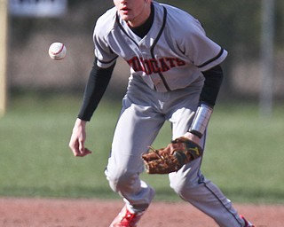 Struthers SS Kevin Caldwell(10) fields a grounder during 4-5-18 game with Poland at Cene.

William D. Lewis The Vindicator 