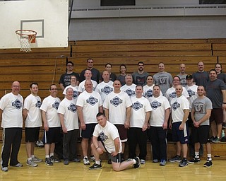 Neighbors | Zack Shively.Glenwood Junior High School had a volleyball championship that included seventh- and eighth-grade students, their teachers and the Boardman Police. Pictured are the teachers of the school and the police officers. The two groups played against each other for the event.