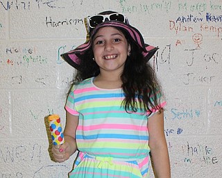 Neighbors | Abby Slanker.A C.H. Campbell Elementary School third-grader wore bright colors and a floppy straw hat to celebrate the school’s annual Beach Day on March 27.