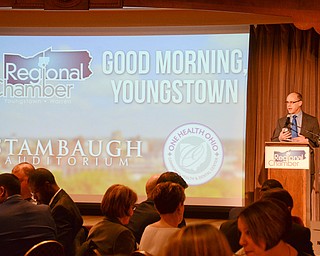 Guy Coviello, Vice President of Government Affairs, welcomes guests to the Youngstown/Warren Regional Chamber of Commerce's "Good Morning, Youngstown" breakfast at Stambaugh Auditorium on Friday, April 6, 2018...Photo by Scott Williams - The Vindicator.