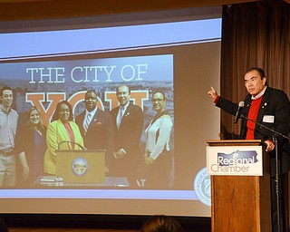 Dr. Ronald Dwinnells, CEO of One Health Ohio, addresses guests at the Youngstown/Warren Regional Chamber of Commerce's "Good Morning, Youngstown" breakfast at Stambaugh Auditorium on Friday, April 6, 2018.

Photo by Scott Williams - The Vindicator