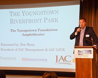 Eric Ryan, President of JAC Management Group, discusses The Youngstown Riverfront Park and Amphitheater project at the Youngstown/Warren Regional Chamber of Commerce's "Good Morning, Youngstown" breakfast at Stambaugh Auditorium on Friday, April 6, 2018.

Photo by Scott Williams - The Vindicator