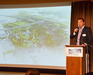 Eric Ryan, President of JAC Management Group, discusses The Youngstown Riverfront Park and Amphitheater project at the Youngstown/Warren Regional Chamber of Commerce's "Good Morning, Youngstown" breakfast at Stambaugh Auditorium on Friday, April 6, 2018.

Photo by Scott Williams - The Vindicator