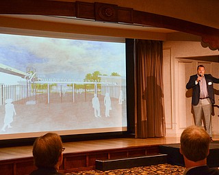 Eric Ryan, President of JAC Management Group, discusses The Youngstown Riverfront Park and Amphitheater project at the Youngstown/Warren Regional Chamber of Commerce's "Good Morning, Youngstown" breakfast at Stambaugh Auditorium on Friday, April 6, 2018.

Photo by Scott Williams - The Vindicator