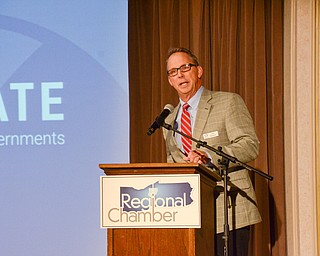 James Kinnick, Executive Director of Eastgate Regional Council of Governments, addresses guests at the Youngstown/Warren Regional Chamber of Commerce's "Good Morning, Youngstown" breakfast at Stambaugh Auditorium on Friday, April 6, 2018.

Photo by Scott Williams - The Vindicator