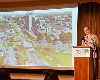 James Kinnick, Executive Director of Eastgate Regional Council of Governments, addresses guests at the Youngstown/Warren Regional Chamber of Commerce's "Good Morning, Youngstown" breakfast at Stambaugh Auditorium on Friday, April 6, 2018.

Photo by Scott Williams - The Vindicator