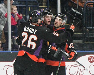 William D. Lewis The Vindicator Phantoms Chase Gresock(19) center gets congrats from Matthew Barry(26) and Michael Joyaux(62) after scoring during 1rst period action 4-6-18 at Covelli.