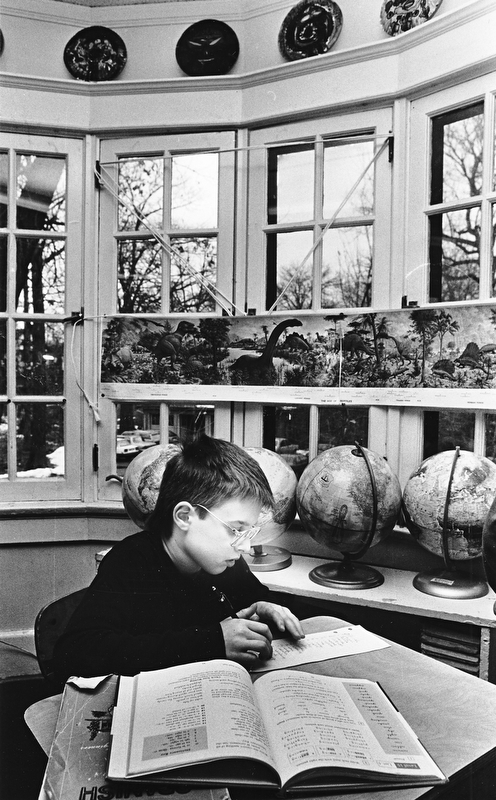 NEW WORDS, NEW WORLDS: Eight-year-old Josh Micholojko improves his dictionary skills.  Kennedy students range in age from four to 14.

Photo taken April 8, 1987.

Photos by Robert DeMay - The Vindicator.