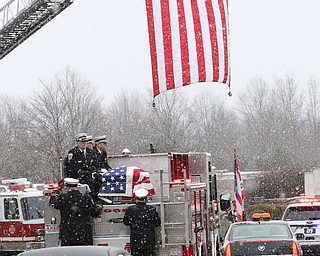  ROBERT K.YOSAY  | THE VINDICATOR.. over 150 cars were in the procession which the firetruck carried the body of chief randall pugh - the procession went south on 46 from mineral ridge to Greenhaven funeral home in canfield.funeral of Weathersfield Township Fire Chief Randall Pugh, who died April 2..-30-