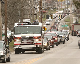  ROBERT K.YOSAY  | THE VINDICATOR.. over 150 cars were in the procession which the firetruck carried the body of chief randall pugh - the procession went south on 46 from mineral ridge to Greenhaven funeral home in canfield.funeral of Weathersfield Township Fire Chief Randall Pugh, who died April 2..-30-