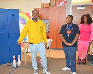 Kaysonn Madison, 10th grade, (left), Brianna James, 11th grade, (center), and Santajah Douglass, 10th grade, (right) act out part of their Destination Imagination group at East East School on Monday, April 9, 2018.

Photo by Scott Williams - The Vindicator